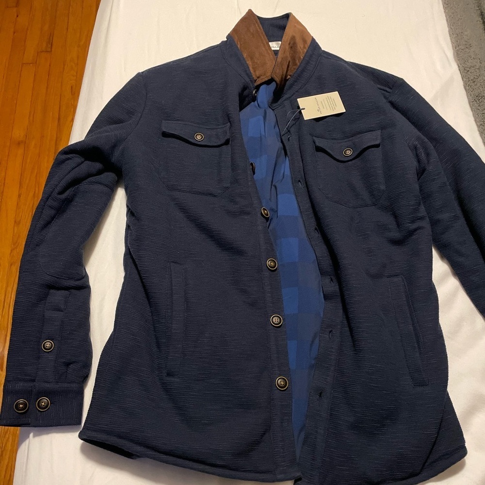 This is a brand new Peter Miller jacket. Never worn. Great condition!!!